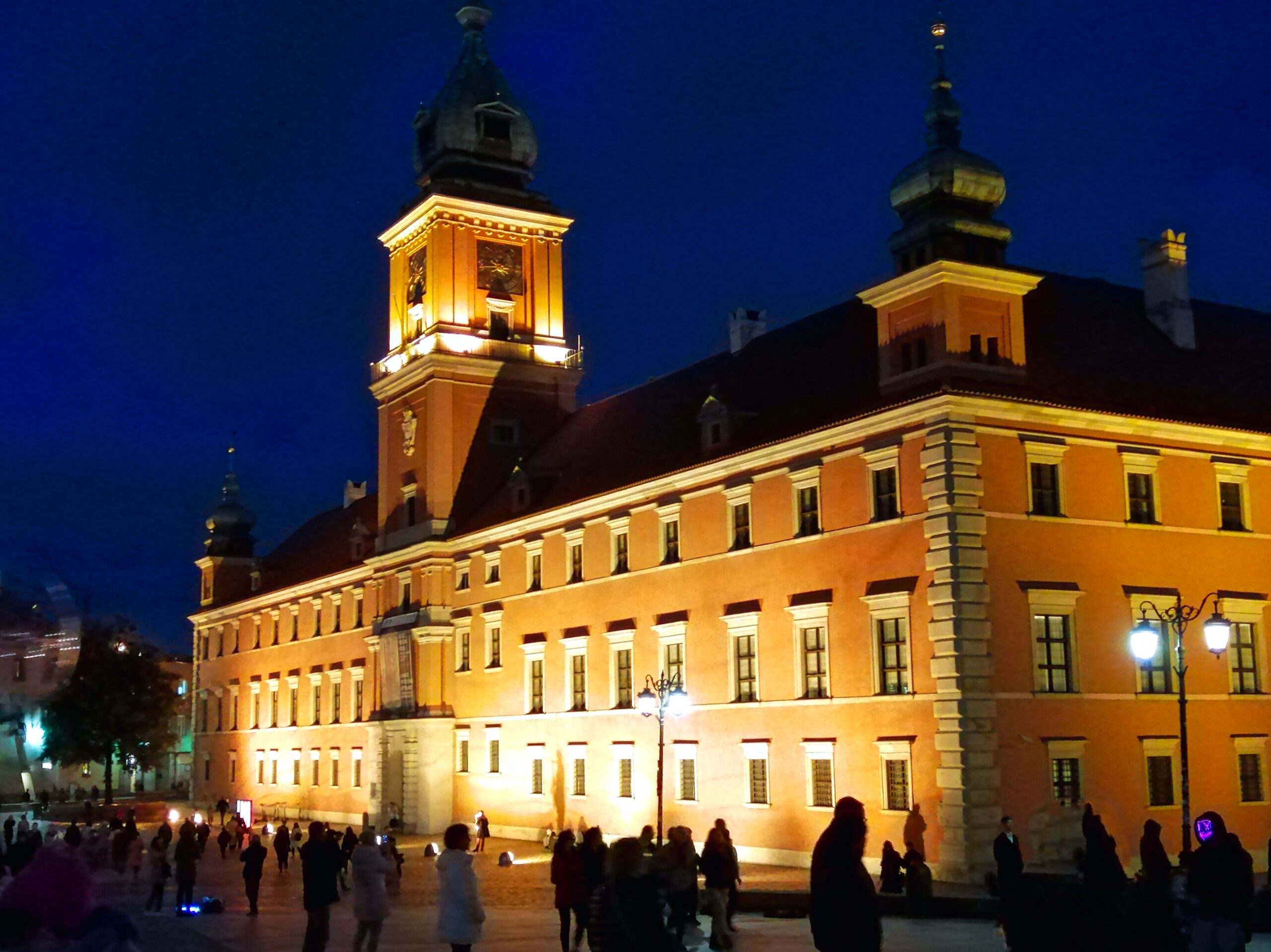 the Royal Castle at night during the weekend trip to the capital city of Poland